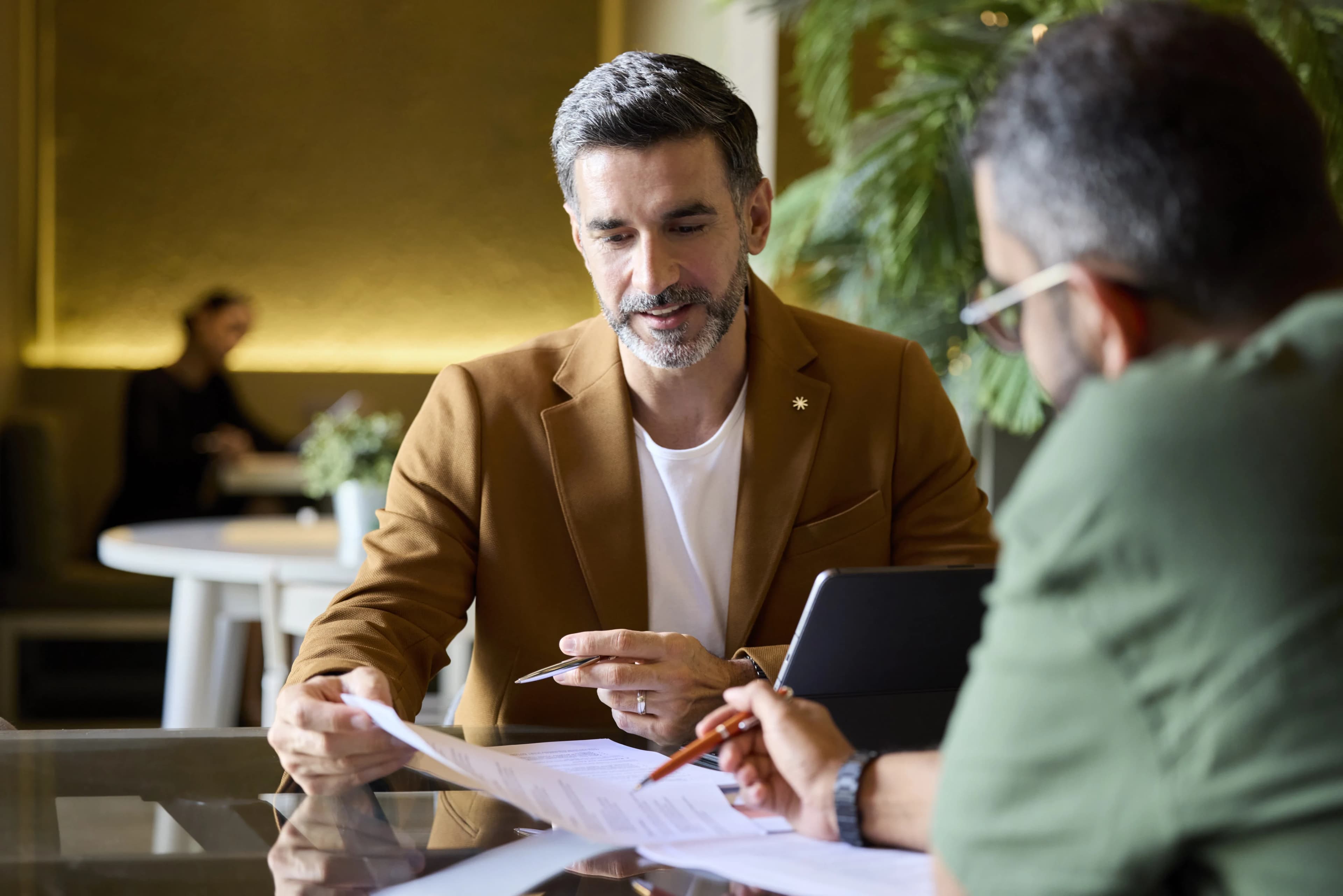 two-men-reviewing-document