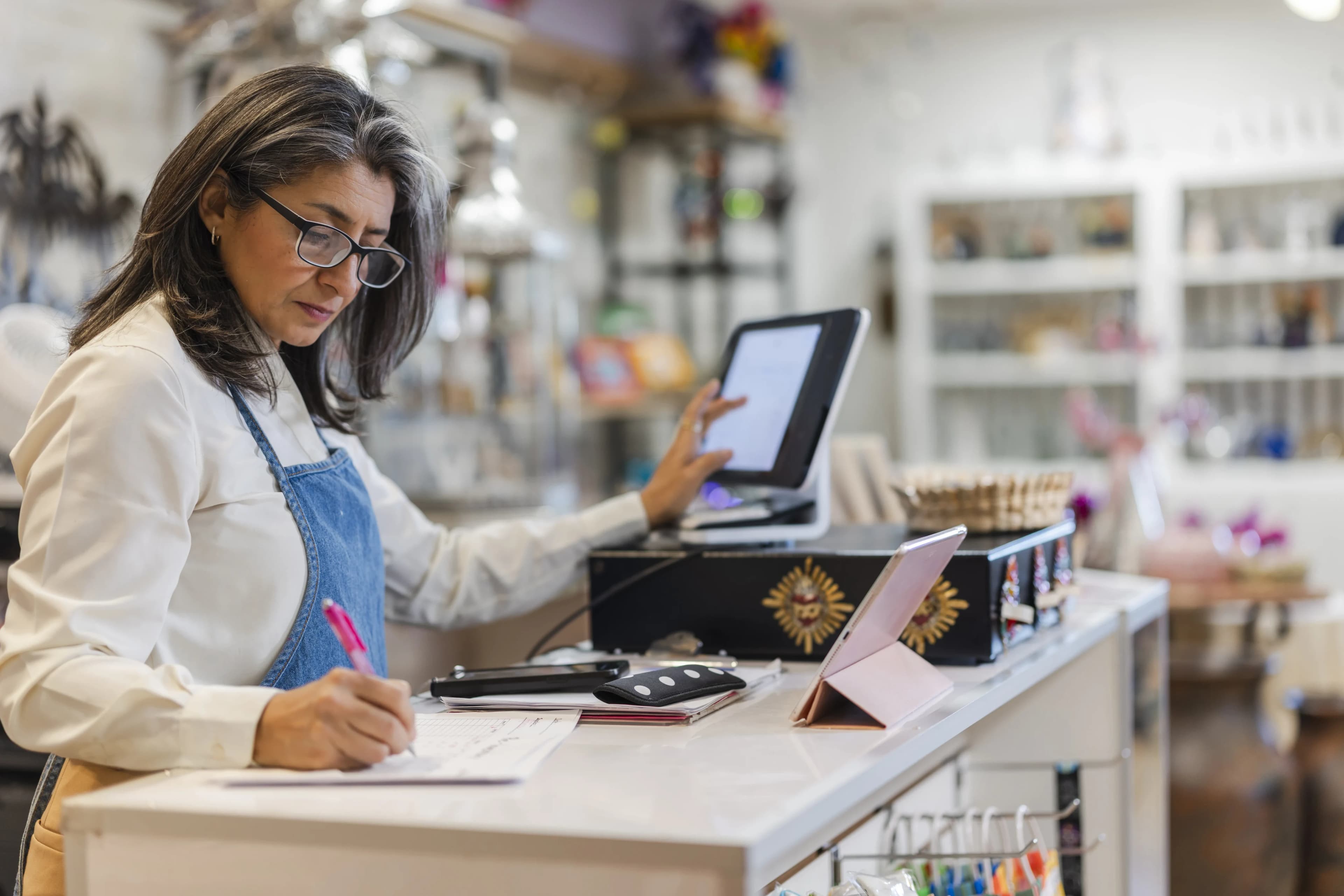 shop-owner-checking-paperwork