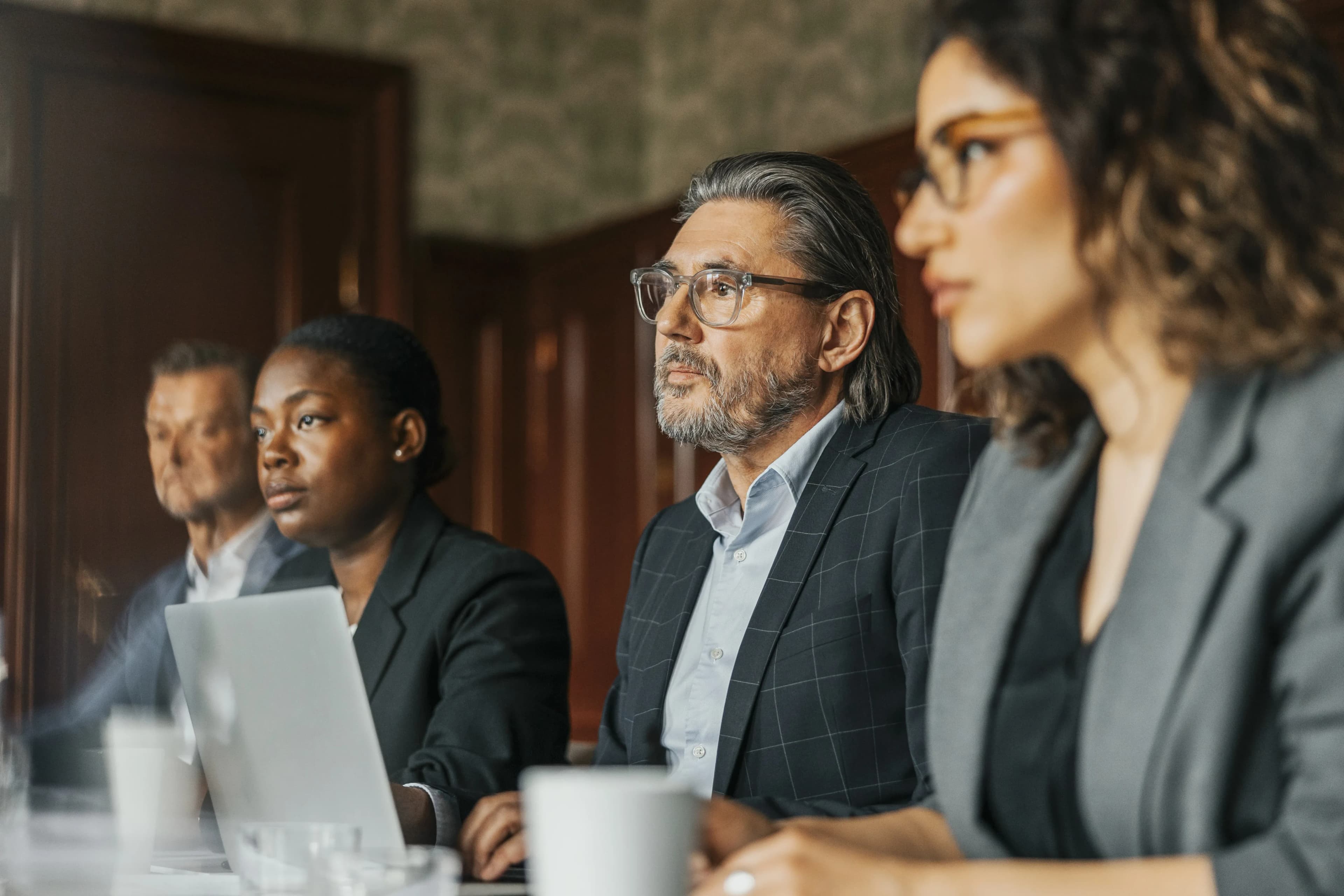 executives-listening-in-boardroom