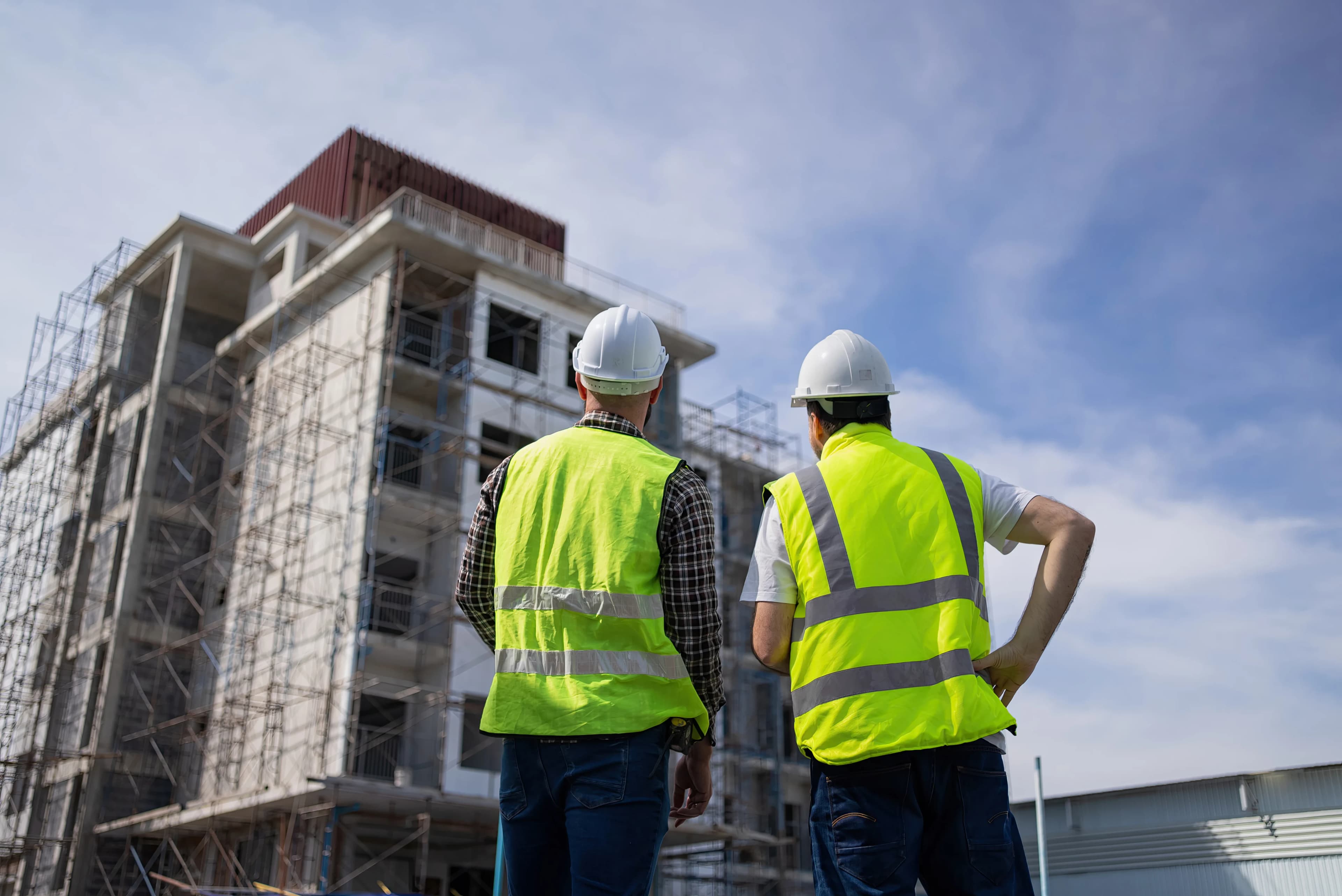 workers-viewing-construction-site