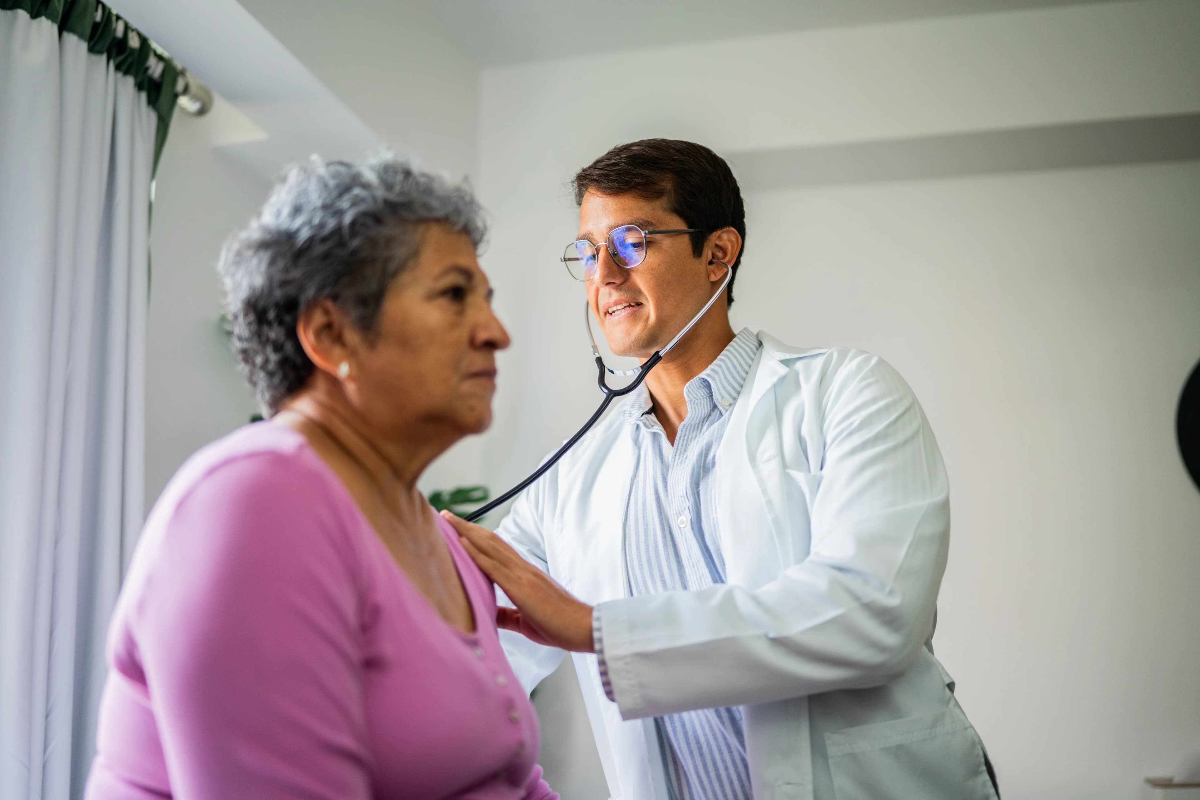 doctor-examining-senior-patient