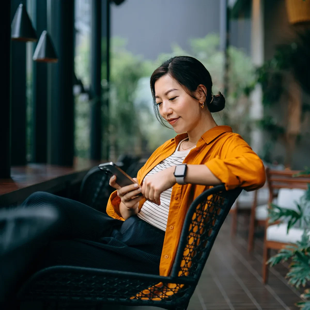 woman-lounging-with-smartwatch
