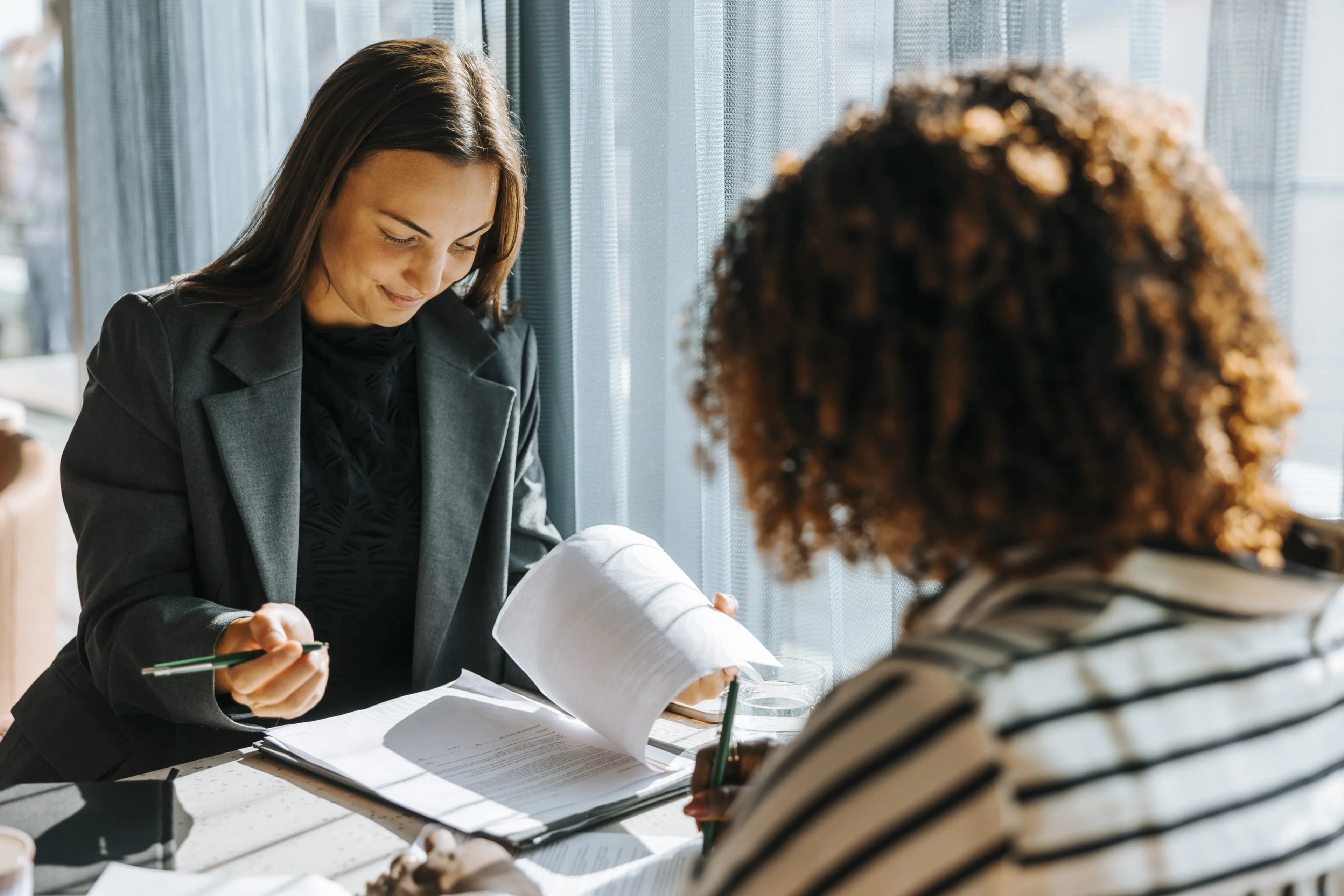 advisor-reviewing-paperwork-client