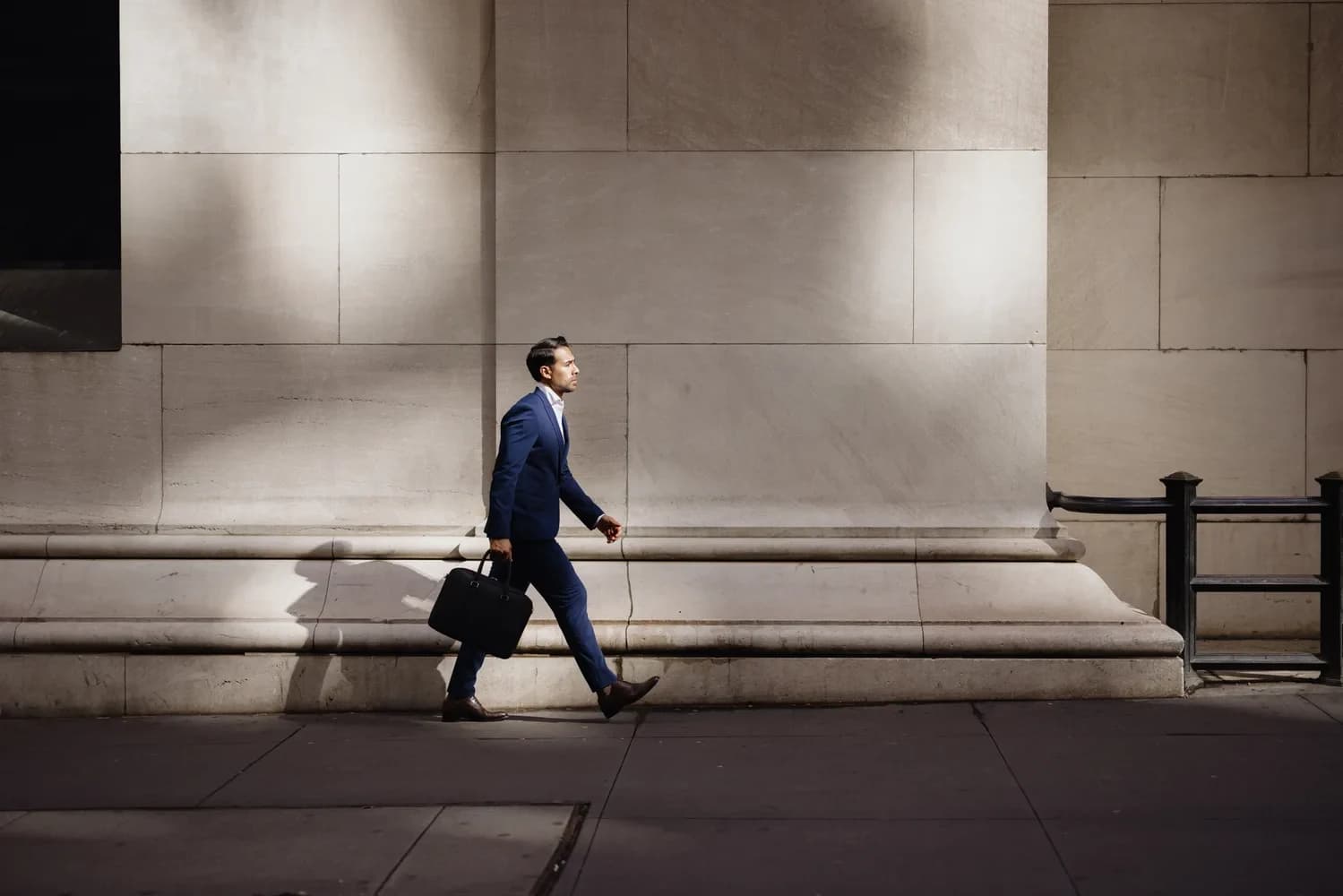 businessman-walking-city-street